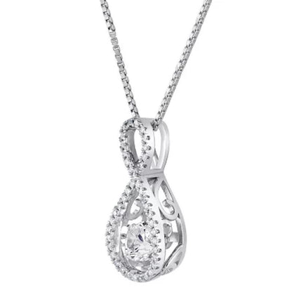 Dancing Lab Created White Sapphire and 0.12 CT. T.W. Diamond Infinity Pendant in Sterling Silver