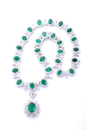 GRACEFUL EMERALD AND DIAMOND NECKLACE. 39.09 CARATS OF FINE GREEN EMERALD