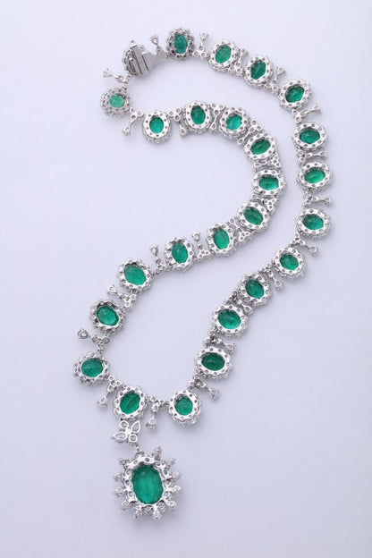 GRACEFUL EMERALD AND DIAMOND NECKLACE. 39.09 CARATS OF FINE GREEN EMERALD