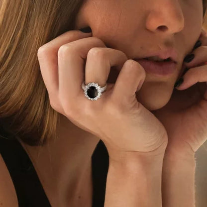Oval Cut Black Sapphire and Created White Sapphire Halo Ring in Sterling Silver