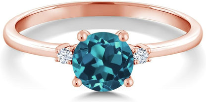 10K Rose Gold London Blue Topaz and White Created Sapphire Solitaire Engagement Ring for Women (0.78 Cttw, round 6MM, Gemstone November Birthstone, Available in Size 5,6,7,8,9)