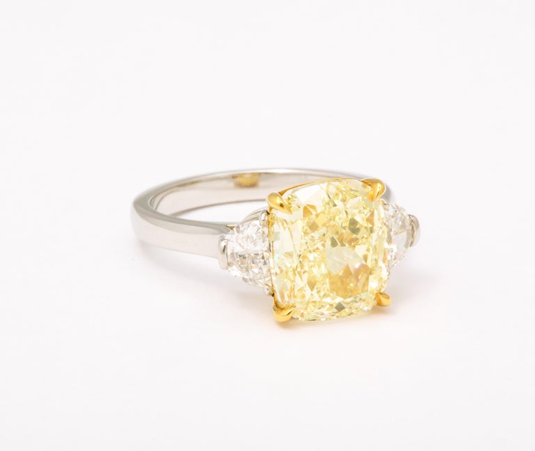 GIA Certified 5 Carat Fancy Light Yellow Cushion Cut Diamond Ring