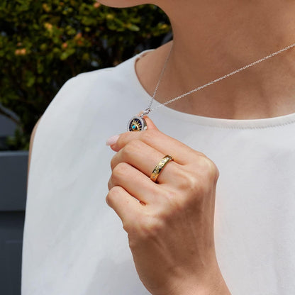 Hallmark Fine Jewelry Sterling Silver and 14K Yellow Gold with 1/6 Cttw Natural White round Diamonds with 13MM Lapis and 2MM Synthetic Turquoise Evil Eye Pendant Necklace, 18" Cable Chain