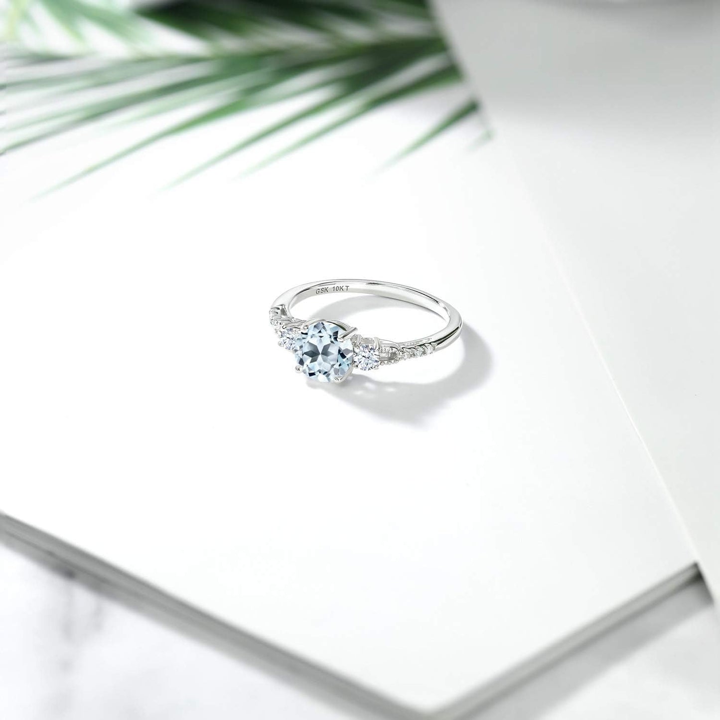 10K White Gold Sky Blue Topaz White Created Sapphire and White Diamond Accent 3-Stone Engagement Ring for Women (1.05 Cttw, round 6MM, Gemstone November Birthstone)