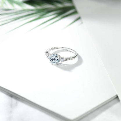 10K White Gold Sky Blue Topaz White Created Sapphire and White Diamond Accent 3-Stone Engagement Ring for Women (1.05 Cttw, round 6MM, Gemstone November Birthstone)