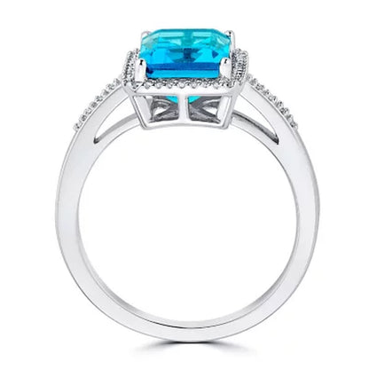 Blue Topaz and 0.14 CT. T.W. Diamond Ring in Sterling Silver