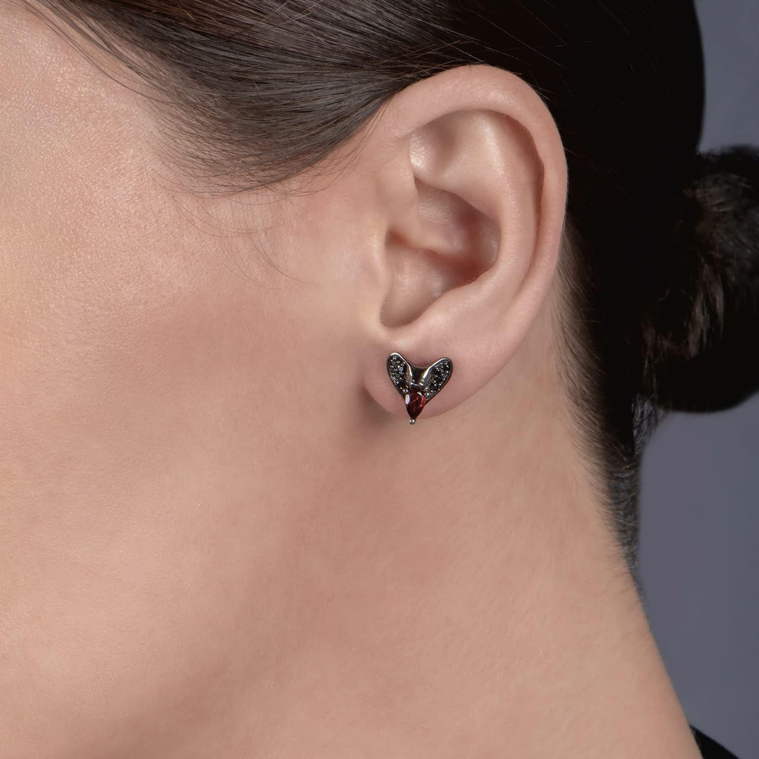 Enchanted Disney Fine Jewelry Black Rhodium over Sterling Silver 5X3 MM Pear Red Garnet and 1/8 Cttw Treated Black round Diamond Jafar Stud Earrings