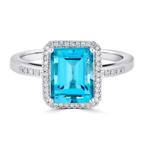 Blue Topaz and 0.14 CT. T.W. Diamond Ring in Sterling Silver