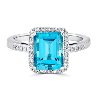 Blue Topaz and 0.14 CT. T.W. Diamond Ring in Sterling Silver