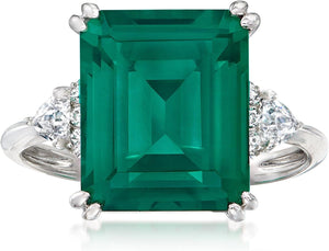 6.00 Ct. T.W. Simulated Emerald and .19 Ct. T.W. CZ Ring in Sterling Silver. Size 8