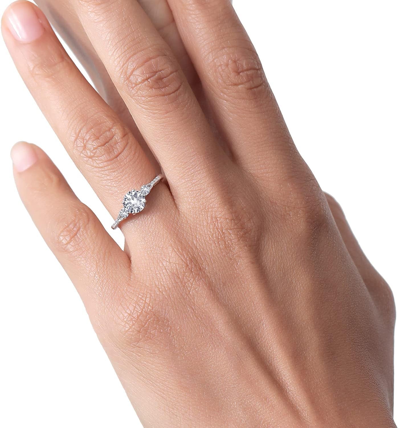 10K White Gold White Created Sapphire and White Diamond Accent 3-Stone Engagement Ring for Women (1.35 Cttw, round 6MM, Gemstone September Birthstone)