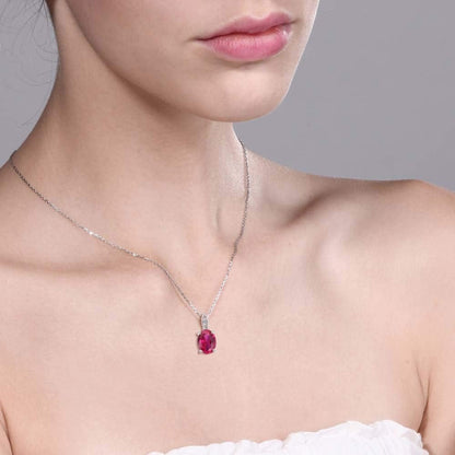 10K White Gold Red Created Ruby and White Diamond Pendant Necklace for Women (2.00 Cttw, Oval 9X7MM, with 18 Inch Chain)
