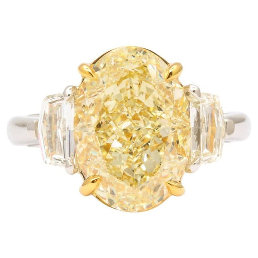 Stunning 6 Carat Oval Yellow Diamond Ring GIA Certified Platinum